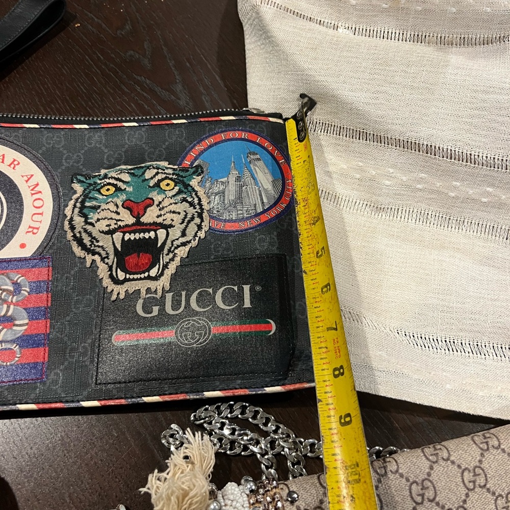 Used twice Gucci oversized clutch/with wrist strap. Patchwork - Picture 3 of 4
